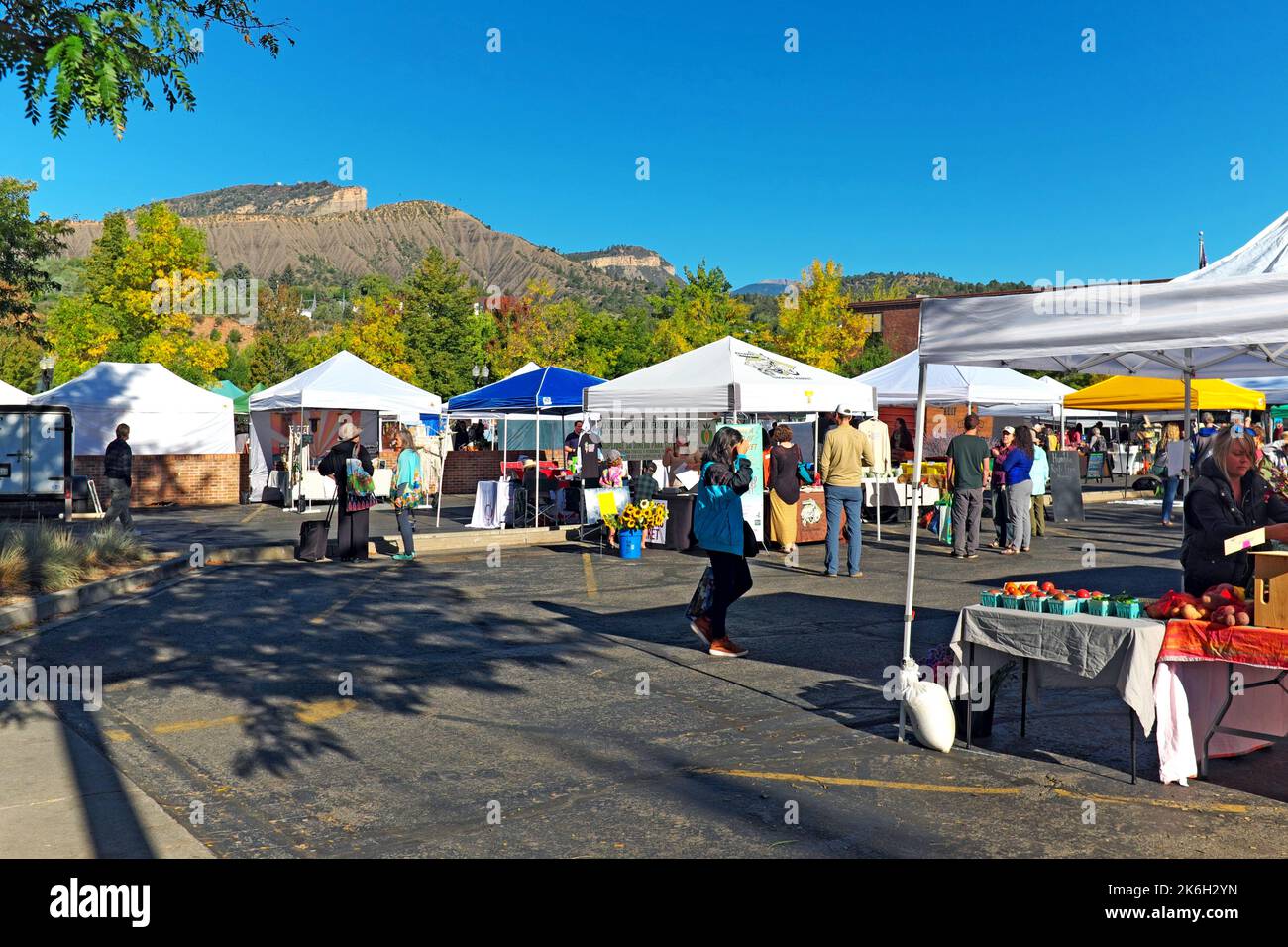 Sunny fall farmers market offers local products to the Southwest Colorado community of Durango in operation from May-October every Saturday morning. Stock Photo