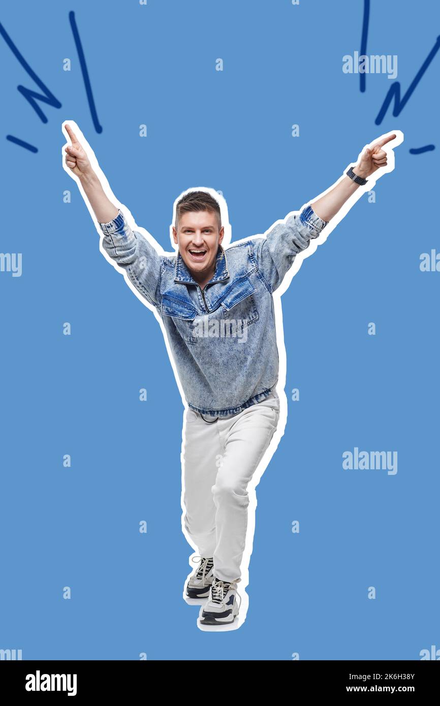 young man in denim clothes jumping and dancing . Stock Photo