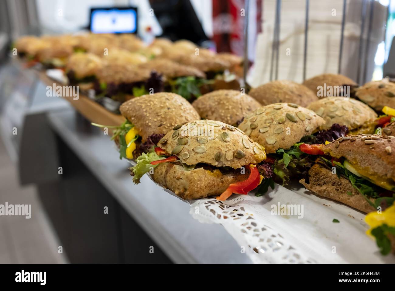 https://c8.alamy.com/comp/2K6H43M/lot-of-sesame-sandwiches-lie-on-the-counter-in-a-cafe-2K6H43M.jpg