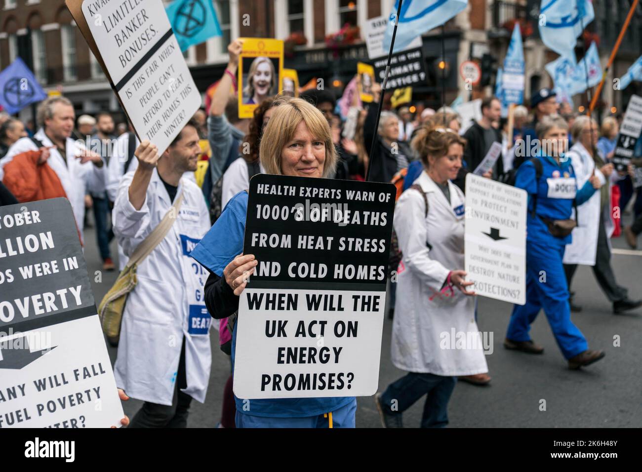 London, UK. 14 Oct, 2022. Extinction Rebellion protesters march from Trafalgar Square to Downing Street via Whitehall demanding the government does more to address climate change, in London, UK. Credit: Vladimir Morozov/Alamy Live News. Stock Photo