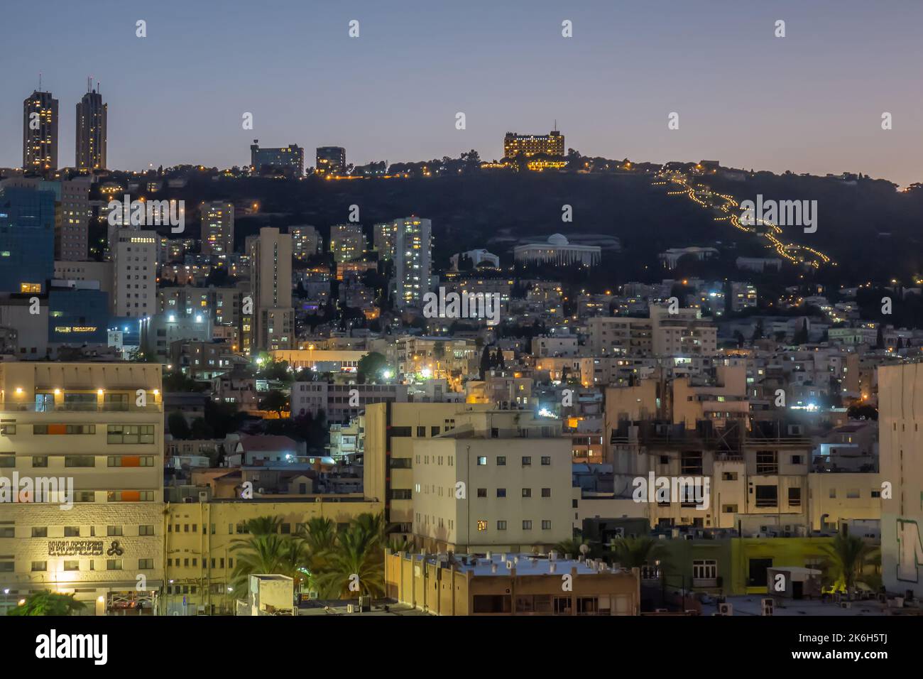 Israel, Haifa, city & Mount Carmel at dusk Stock Photo