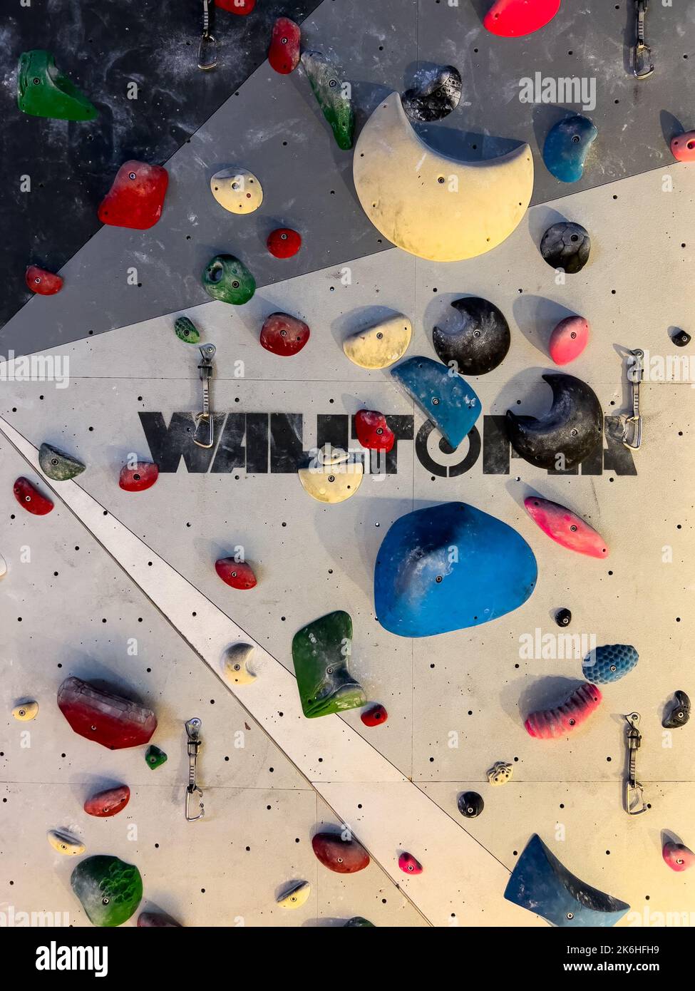 Artificial colourful climbing walls for practice in an indoor setting