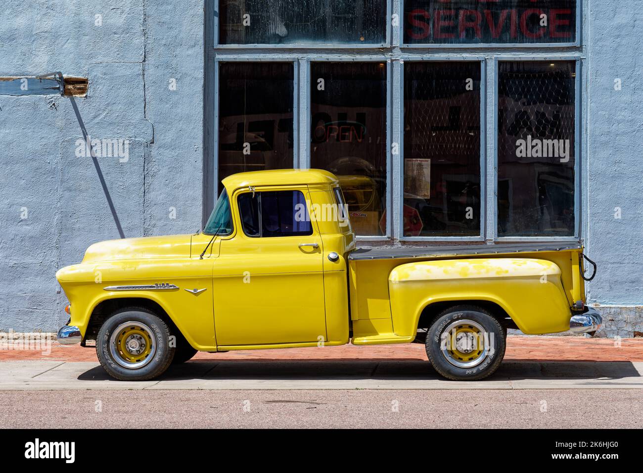 Victor, CO - July 9, 2022: Yellow 50s era Chevrolet 3100 pickup truck Stock Photo