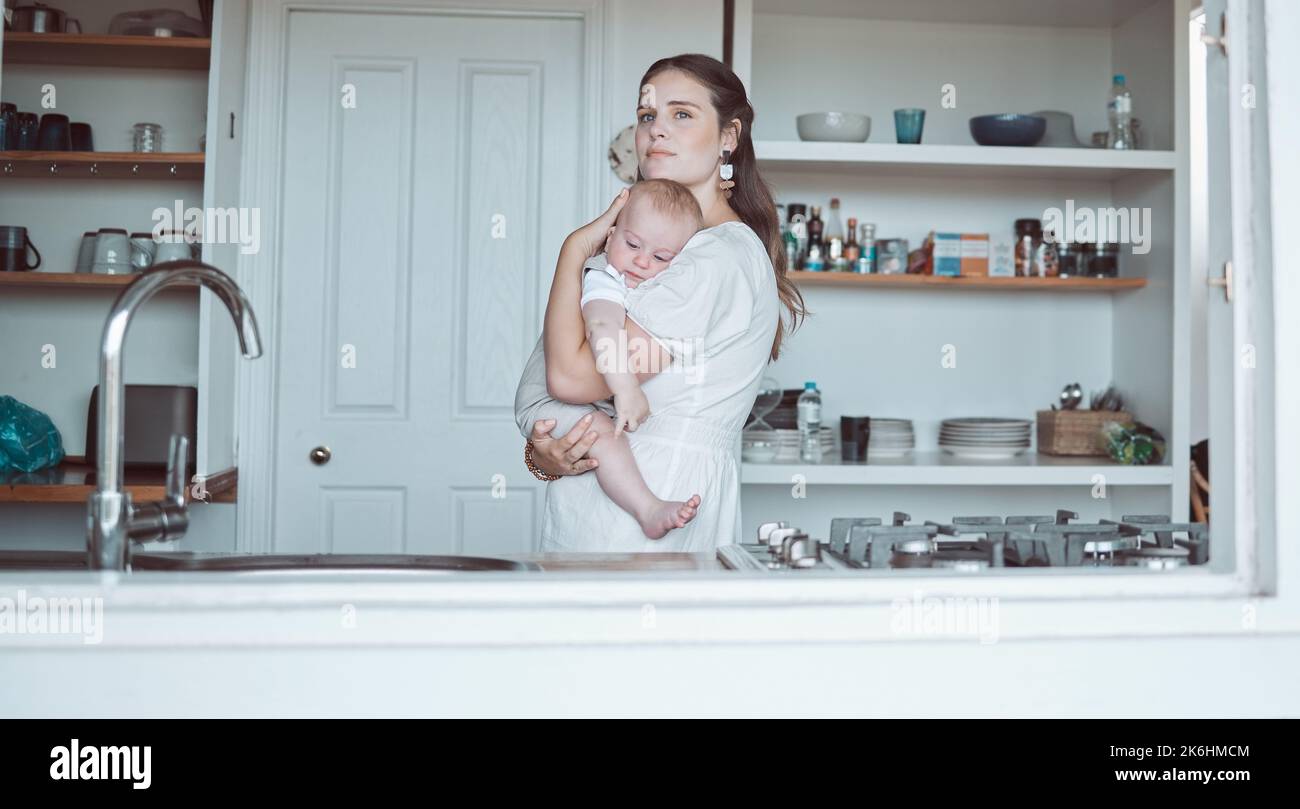 I know what love is. a beautiful young mother bonding with her newborn at home. Stock Photo