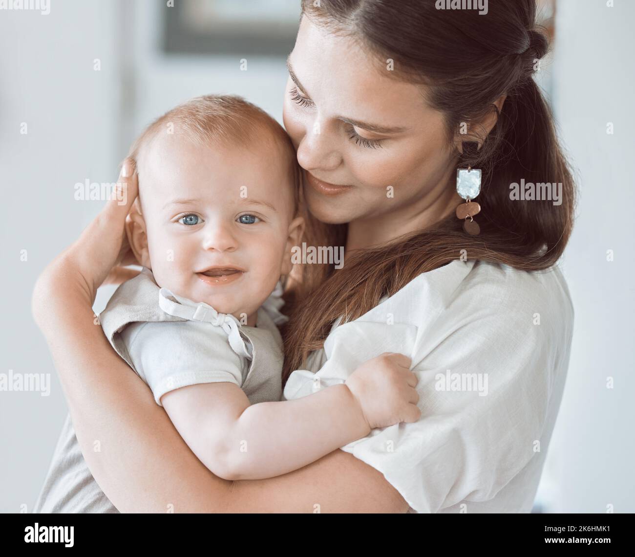 You made a miracle mama. a beautiful young mother bonding with her newborn at home. Stock Photo