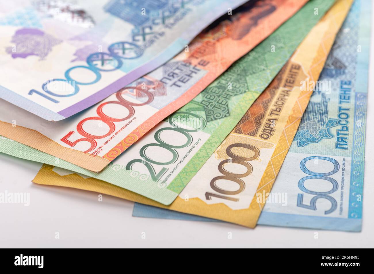 Kazakhstan money - tenge. 500, 1000, 2000, 5000, 10000 banknotes. Close up of tenge on white background. Stock Photo