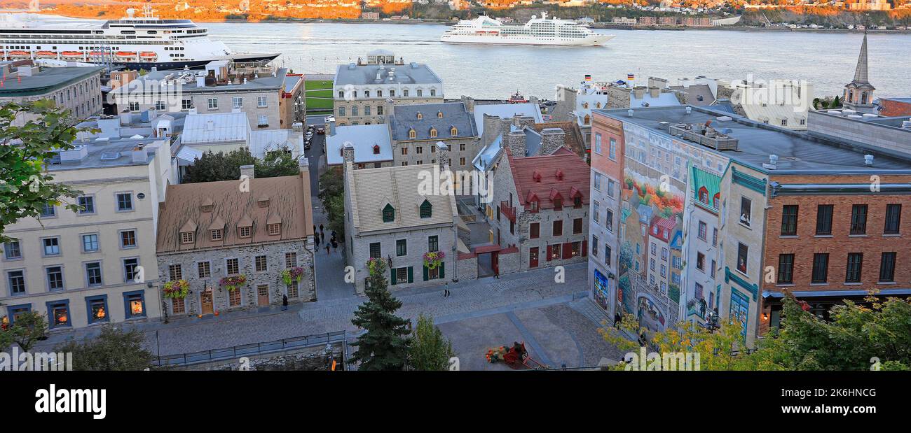 Aerial view of Old Quebec City during the sunset, including Saint Lawrence River and boats cruises in autumn, Canada Stock Photo