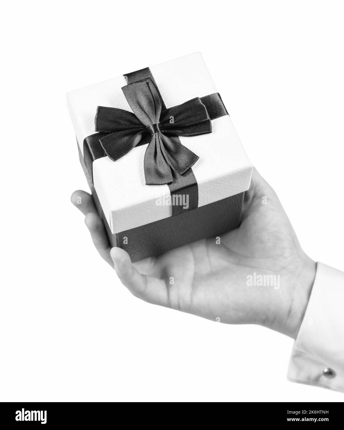 present box in hand isolated on white background, shopping Stock Photo