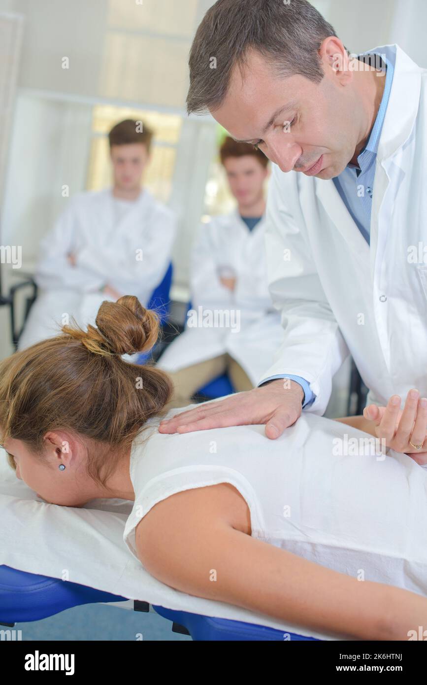 a male chiropractor at work Stock Photo