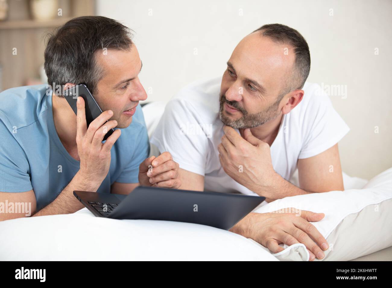 men portrait with laptop and mobile phone Stock Photo - Alamy