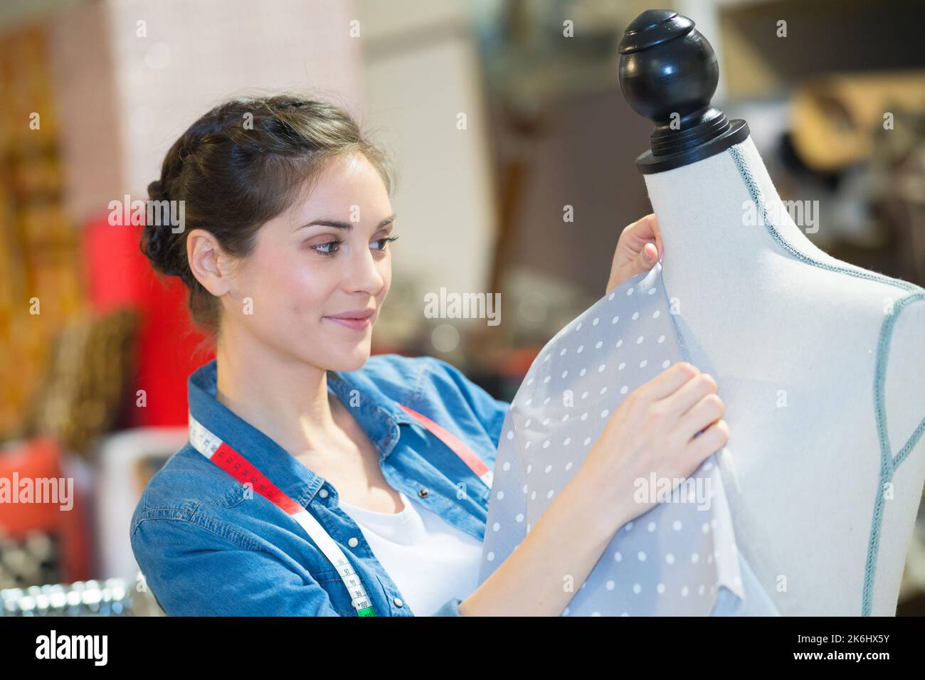 working on new dress Stock Photo - Alamy