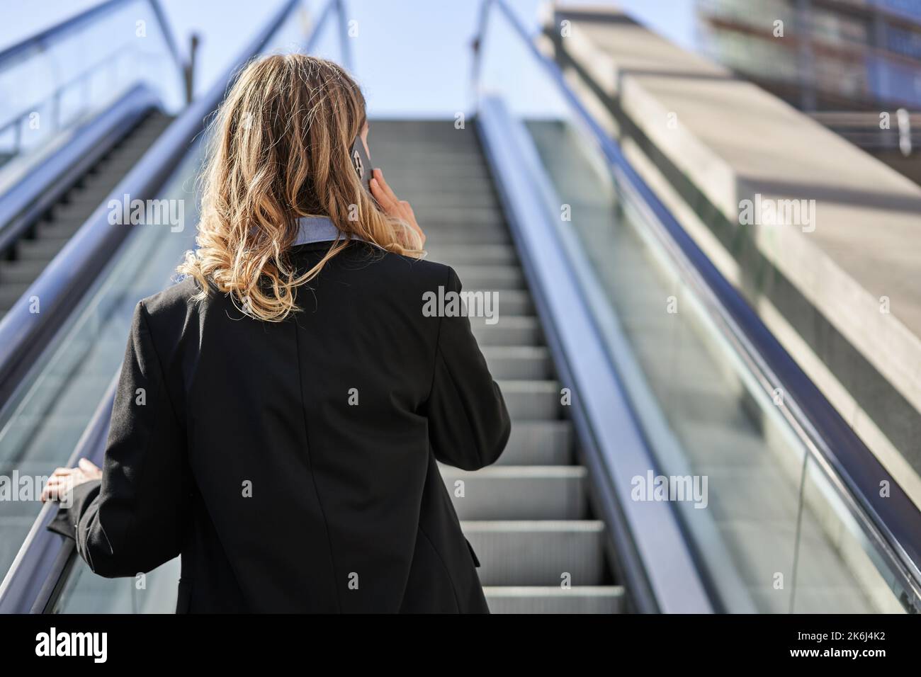 Female rear view mobile texting hi-res stock photography and images - Alamy
