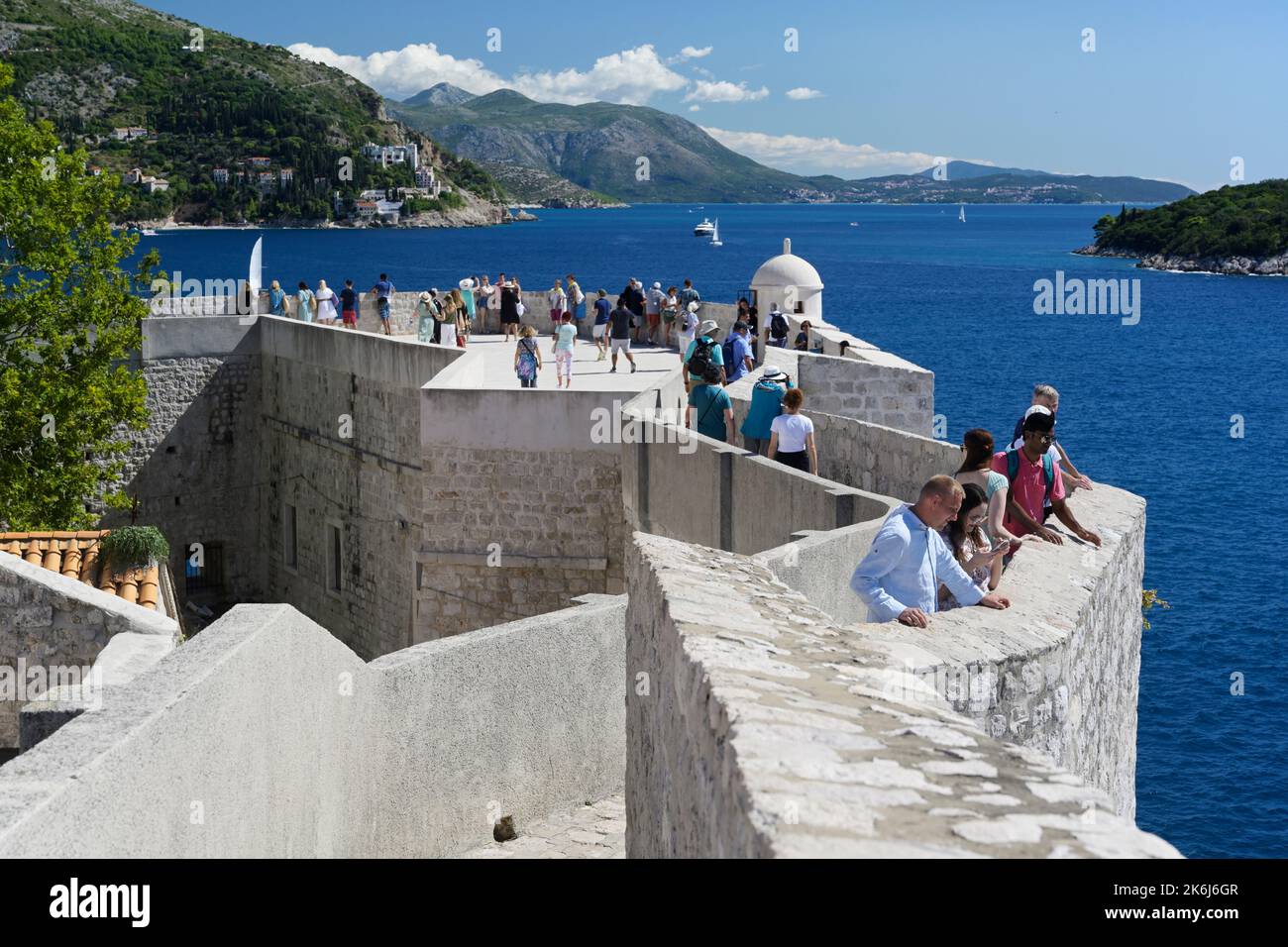 Dubrovnik city walls with tourists Stock Photo