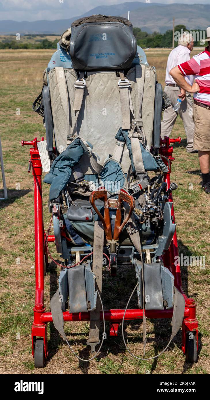 Stanesti, Gorj, Romania – August 27, 2022:  The ejection seat of military aircraft is presented to visitors at the air show at the Stanesti aerodrome, Stock Photo