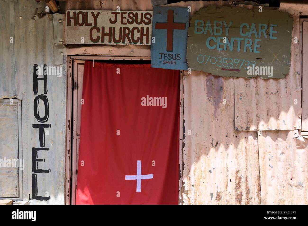 KENYA, Nairobi, Kibera slum, free church or pentecostal church Holy Jesus with baby care centre / KENIA, Nairobi, Slum Kibera, Pfingstkirche Holy Jesus Church Stock Photo