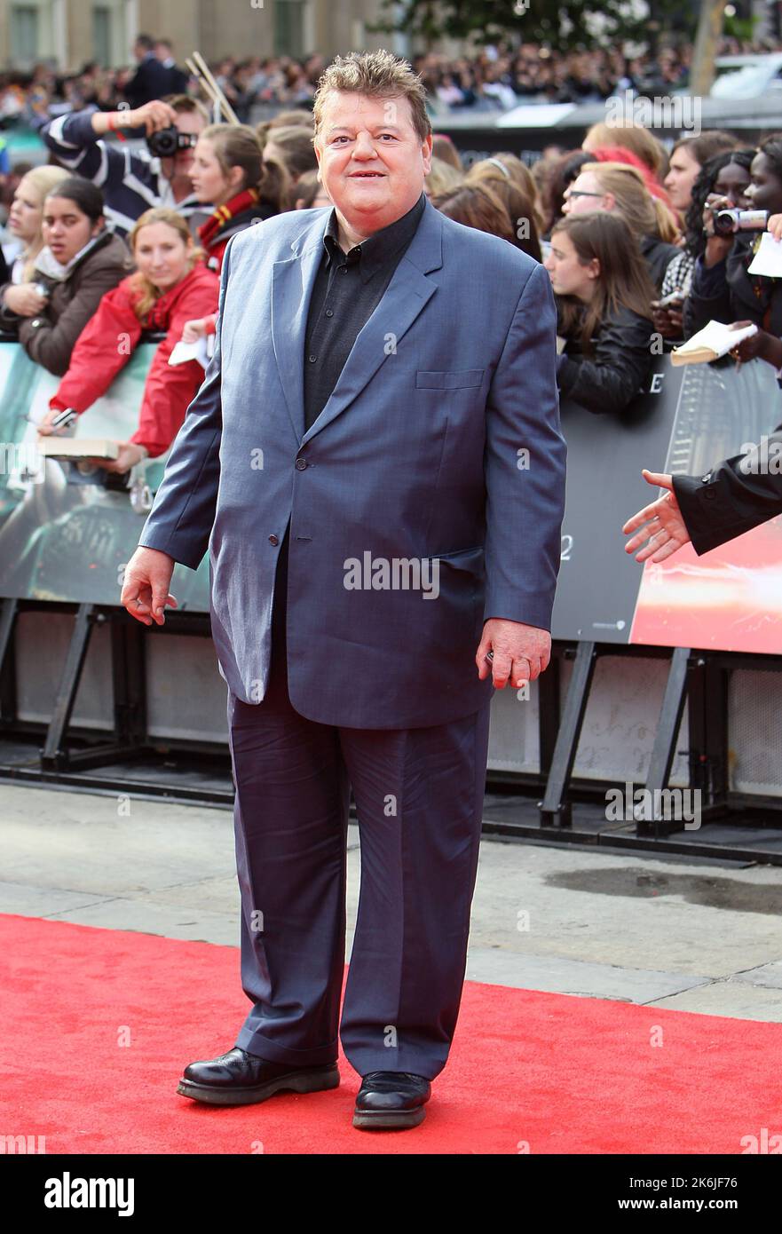File photo dated 07/07/2011 of Robbie Coltrane arriving for the world premiere of Harry Potter And The Deathly Hallows: Part 2. The Harry Potter and Cracker actor has died aged 72, his agent has said. Issue date: Friday October 14, 2022. Stock Photo