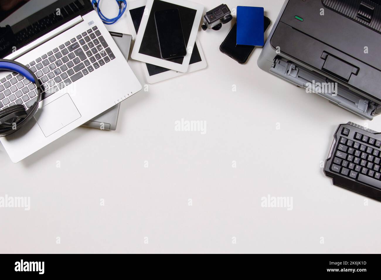 Top view to old laptop computers, digital tablets, mobile smart phones