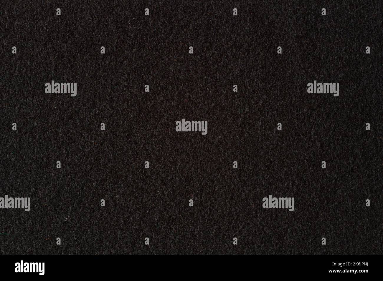 Black color felt textile fabric texture background. Top view Stock Photo