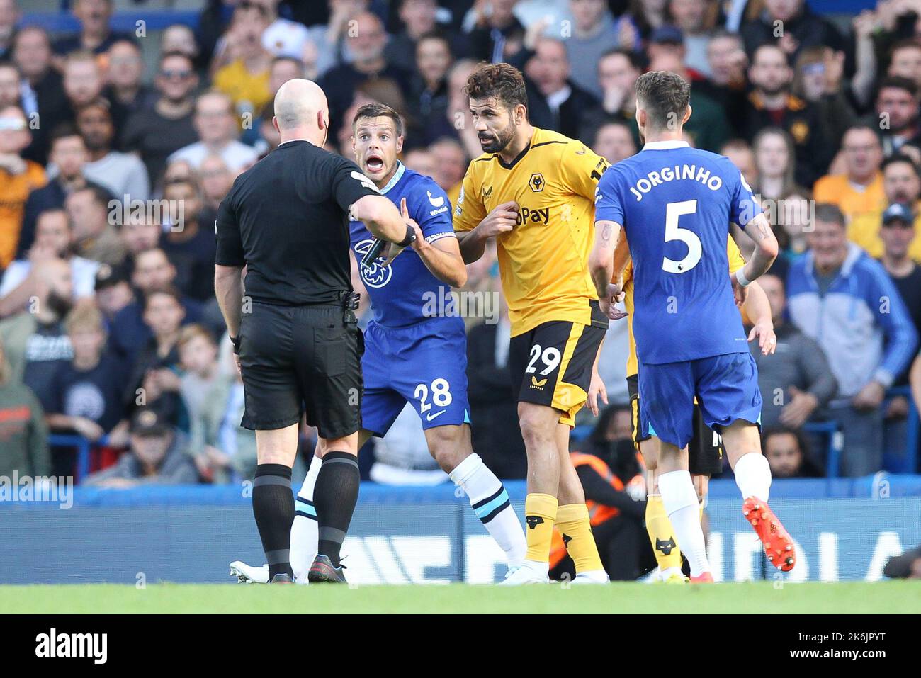 London, UK. 14th Oct, 2022. Csar Azpilicueta of Chelsea is shown a yellow card for a challenge on Diego Costa of Wolverhampton Wanderers during the Premier League match between Chelsea and Wolverhampton Wanderers at Stamford Bridge, London, England on 8 October 2022. Photo by Ken Sparks. Editorial use only, license required for commercial use. No use in betting, games or a single club/league/player publications. Credit: UK Sports Pics Ltd/Alamy Live News Stock Photo