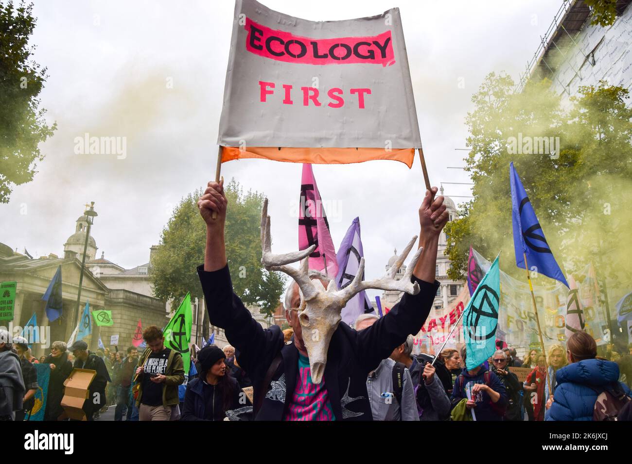 London, England, UK. 14th Oct, 2022. A protester wearing a fake animal skull holds an ''Ecology first'' banner in Whitehall. Extinction Rebellion protesters gathered in Westminster demanding action on the climate crisis and skyrocketing energy bills. (Credit Image: © Vuk Valcic/ZUMA Press Wire) Stock Photo