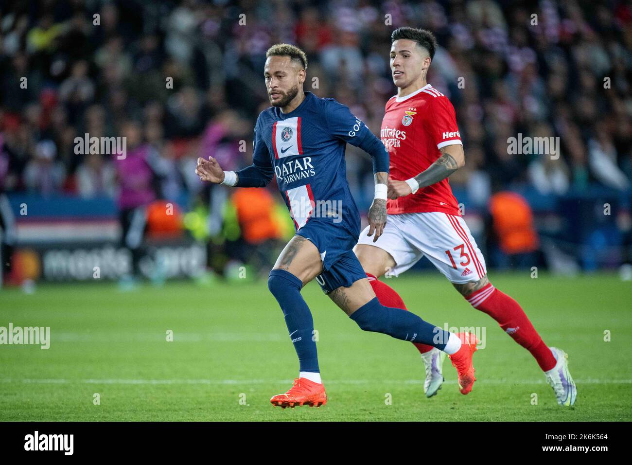PARIS, FRANCE - OCTOBER 11: Neymar of Paris Saint-Germain and Enzo Fernandez of SL Benfica in action during the UEFA Champions League group H match be Stock Photo