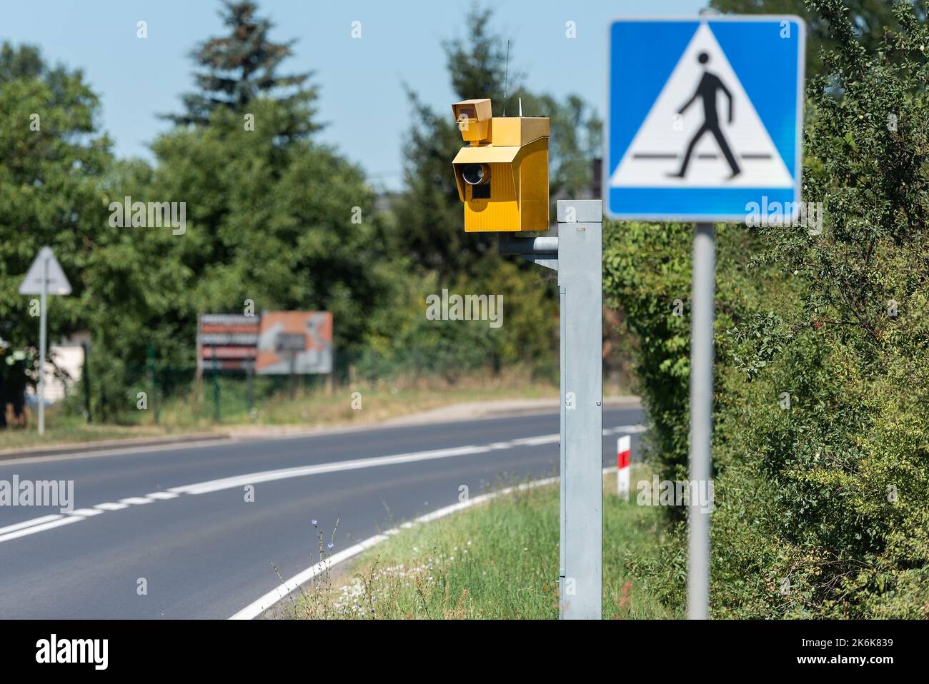 speed camera and pedestrian crossing road sign Stock Photo Alamy