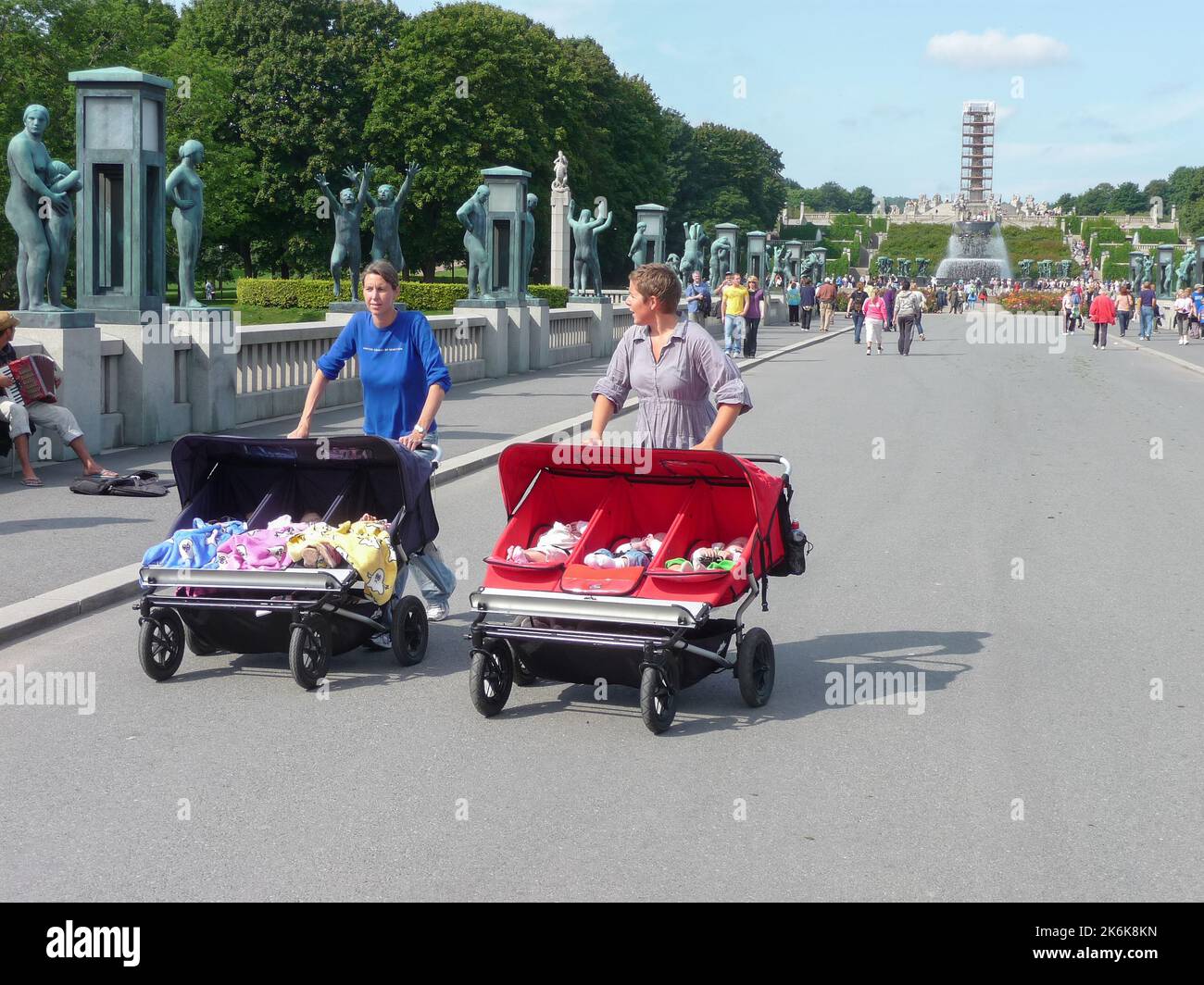 Oslo, Norway (19th August 2008) - Two  ladies push their three babies on their strollers in Vigeland Park Stock Photo