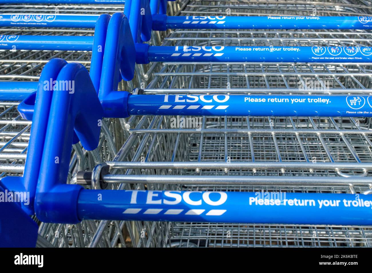 Rows of Tesco trollies lined up outside the supermarket, London, England, United Kingdom, UK Stock Photo