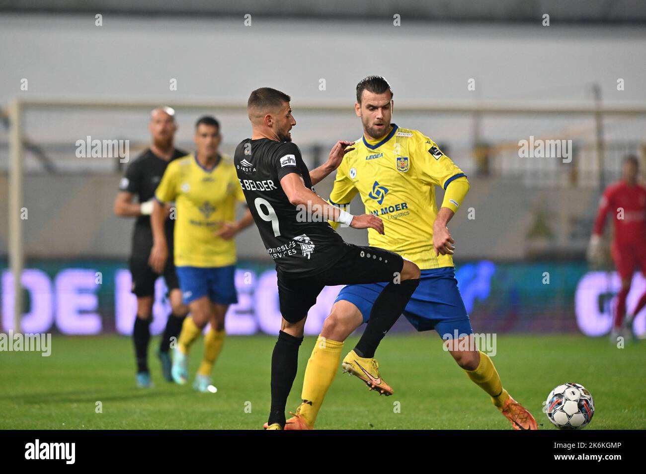 RSCA Futures' Simion Michez and Deinze's Dylan De Belder fight for the ball  during a soccer match between RSC Anderlecht Futures and KMSK Deinze,  Sunday 14 August 2022 in Anderlecht, on day