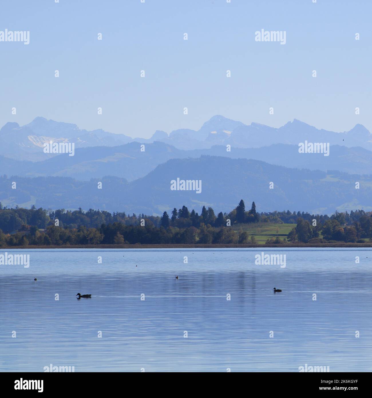 Lake Pfaeffikon and mountain ranges seen from Pfaeffikon, Switzerland. Stock Photo