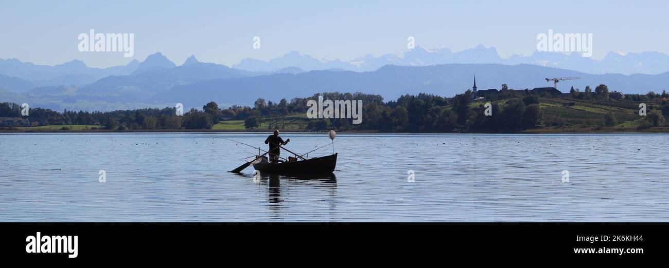 Fishing boat on Lake Pfaeffikon, Zurich. Stock Photo