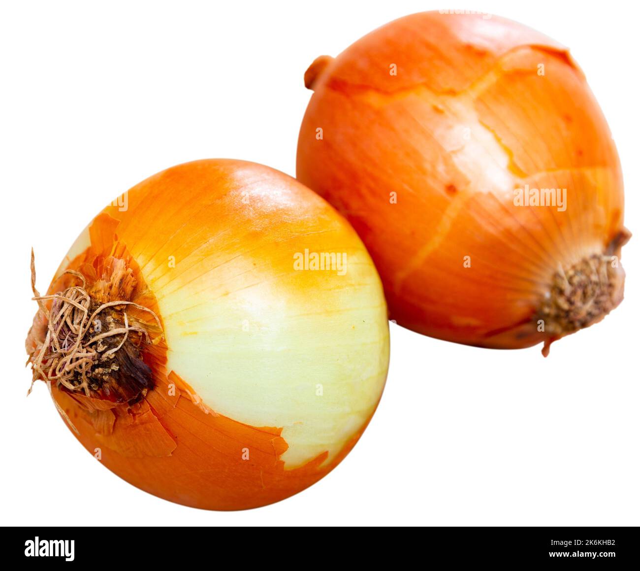 Fresh onions lying on white background Stock Photo