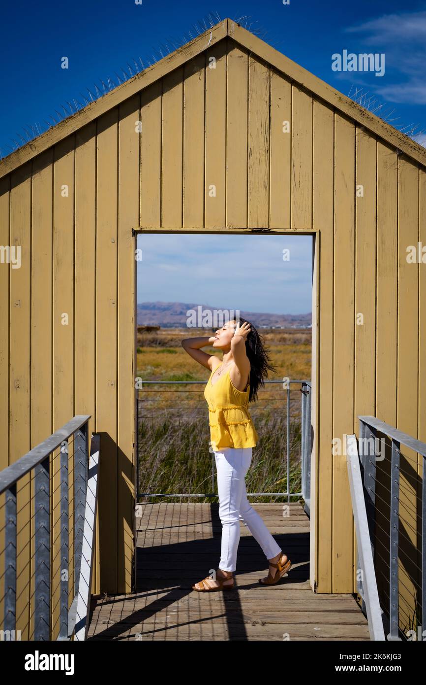 Lifestyle | Portrait of a Young Woman in a Doorway to Nature Stock ...