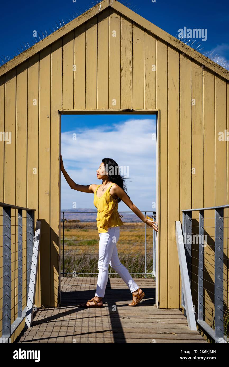 Lifestyle | Portrait of a Young Woman in a Doorway to Nature Stock ...