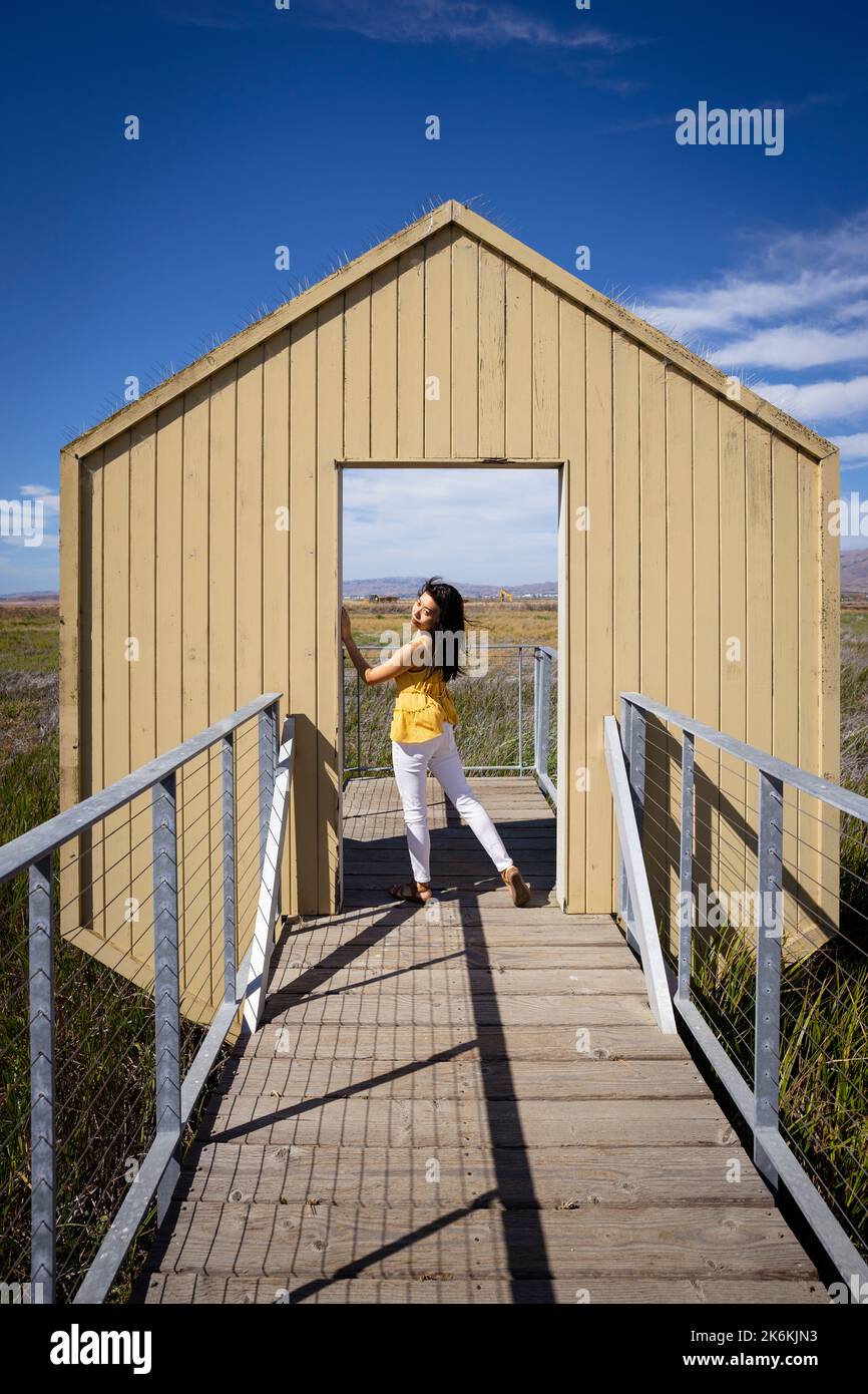 Lifestyle | Portrait of a Young Woman in a Doorway to Nature Stock ...