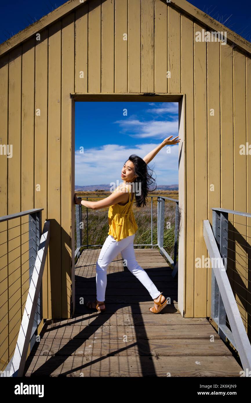 Lifestyle | Portrait of a Young Woman in a Doorway to Nature Stock ...