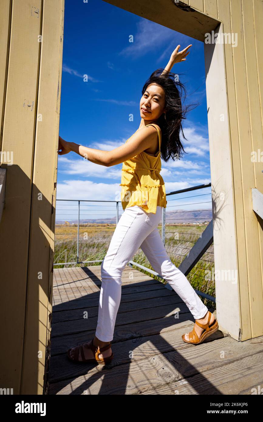 Lifestyle | Portrait of a Young Woman in a Doorway to Nature Stock ...