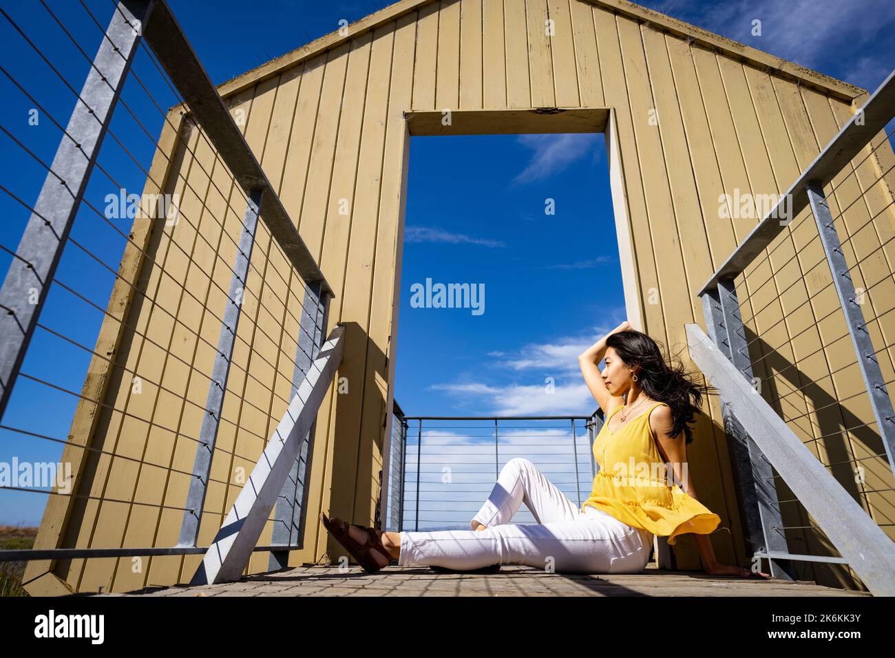 Lifestyle | Portrait of a Young Woman in a Doorway to Nature Stock ...