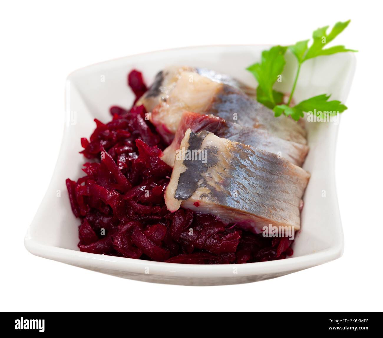 Sliced herring with grated beetroot served on table Stock Photo