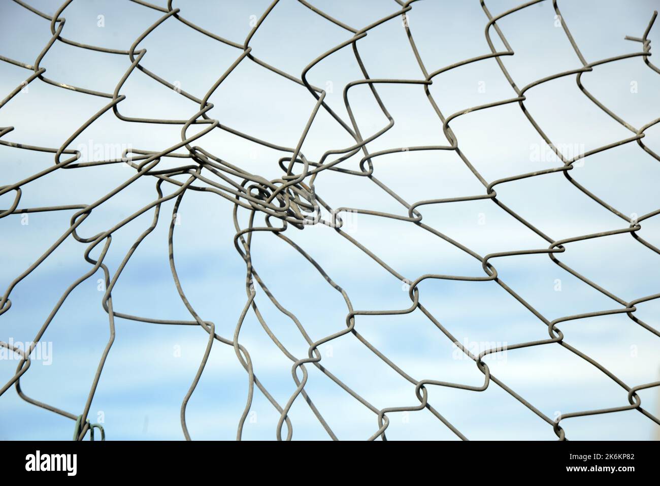 industrial background of twisted fence wire Stock Photo