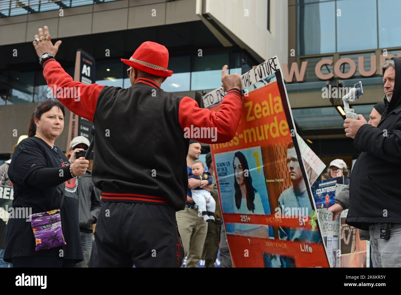 CHRISTCHURCH, NEW ZEALAND, SEPTEMBER 21, 2022, Supporters of Counterspin, a freedom of speech organisation, protest outside the Christchurch Court House, New Zealand, over allegations of members publishing objectionable material Stock Photo