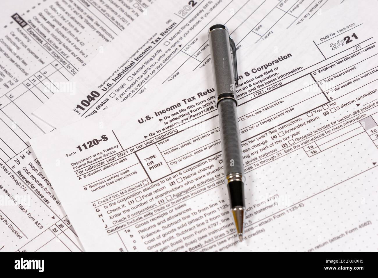 Shot of various IRS tax forms, 1040, 1120S for sending in personal and