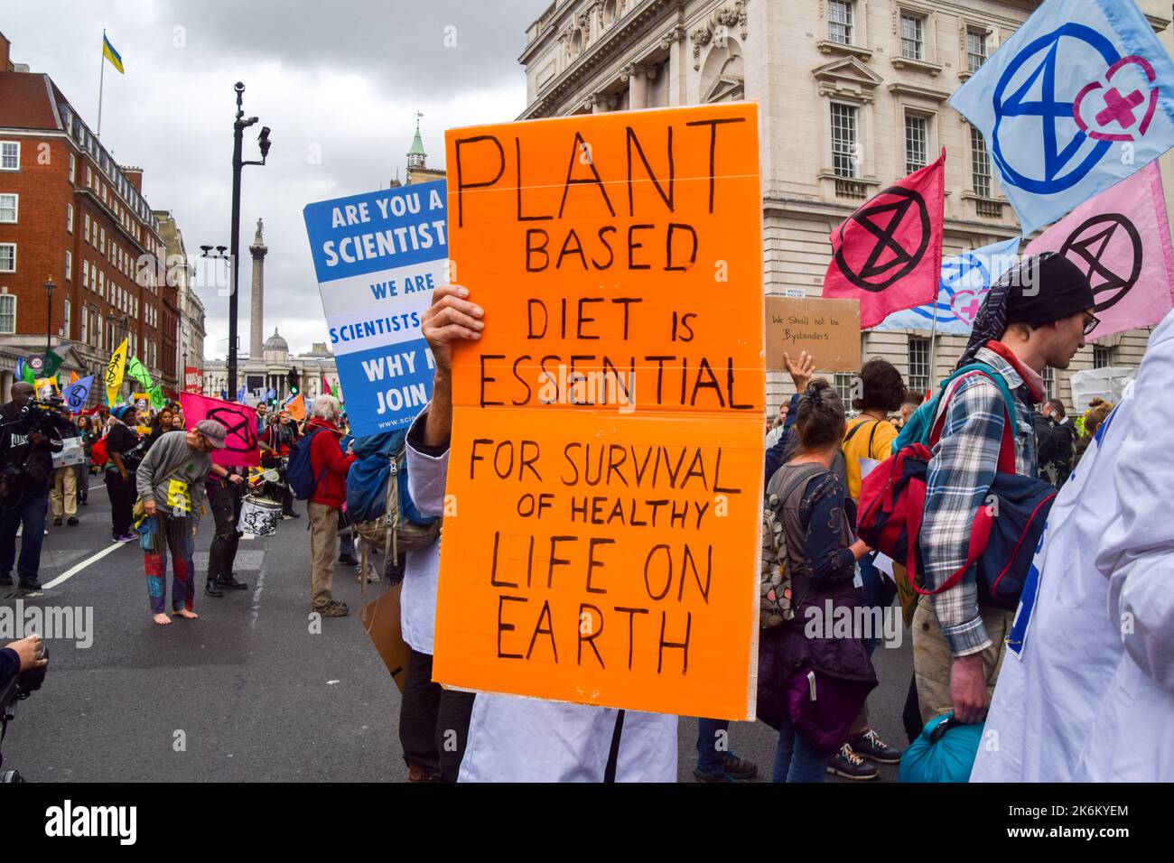 London, UK. 14th Oct, 2022. A protester holds a placard calling for a plant-based diet during the demonstration in Whitehall. Extinction Rebellion protesters gathered in Westminster demanding action on the climate crisis and skyrocketing energy bills. (Photo by Vuk Valcic/SOPA Images/Sipa USA) Credit: Sipa USA/Alamy Live News Stock Photo