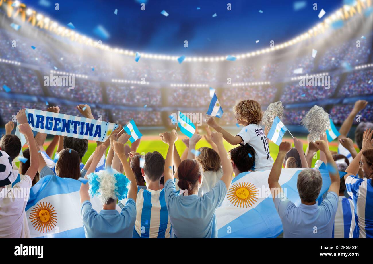 Argentina football supporter on stadium. Argentinian fans on soccer pitch watch team play. Group