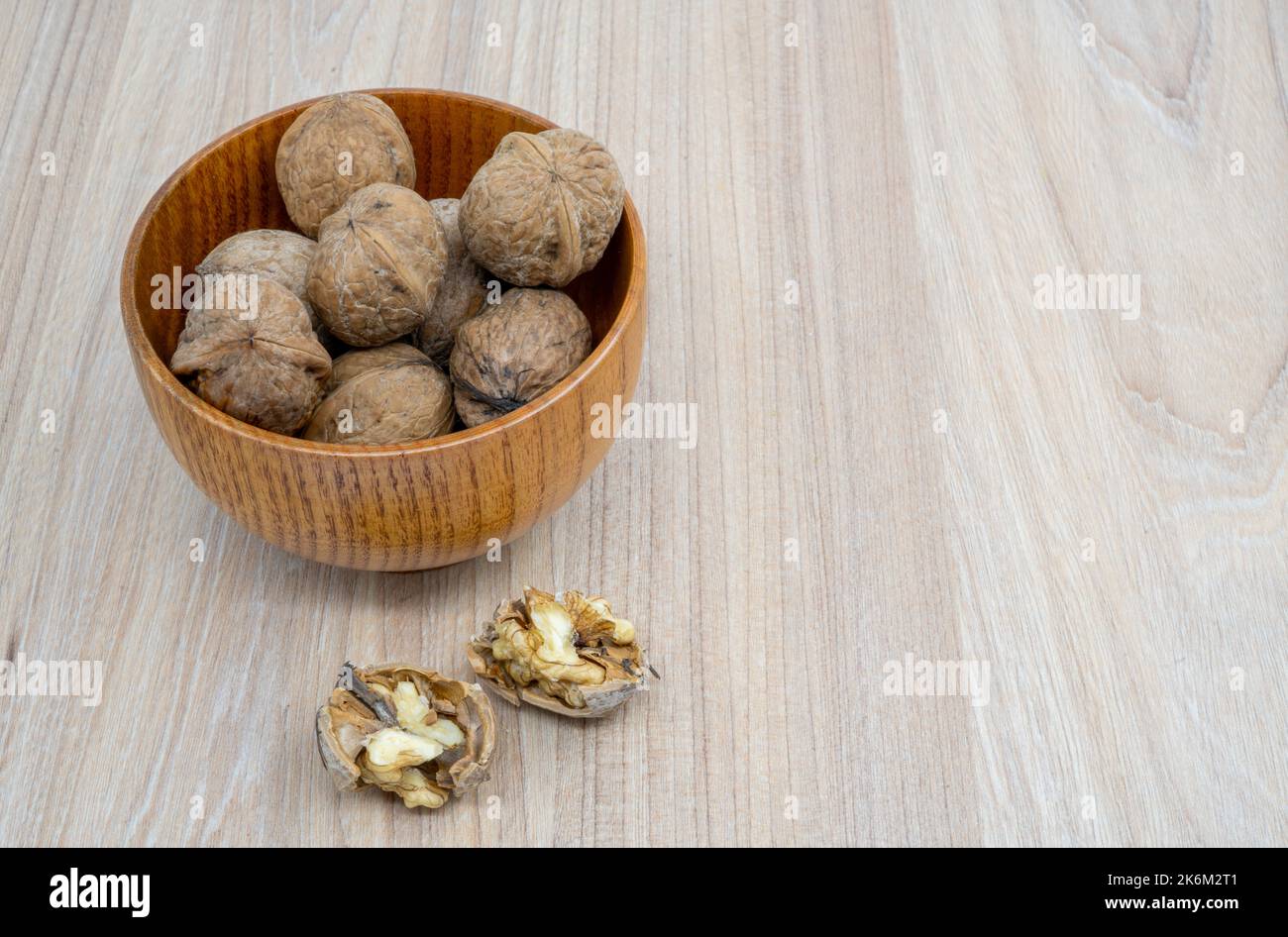 Hazelnuts in a bowl on the table Stock Photo