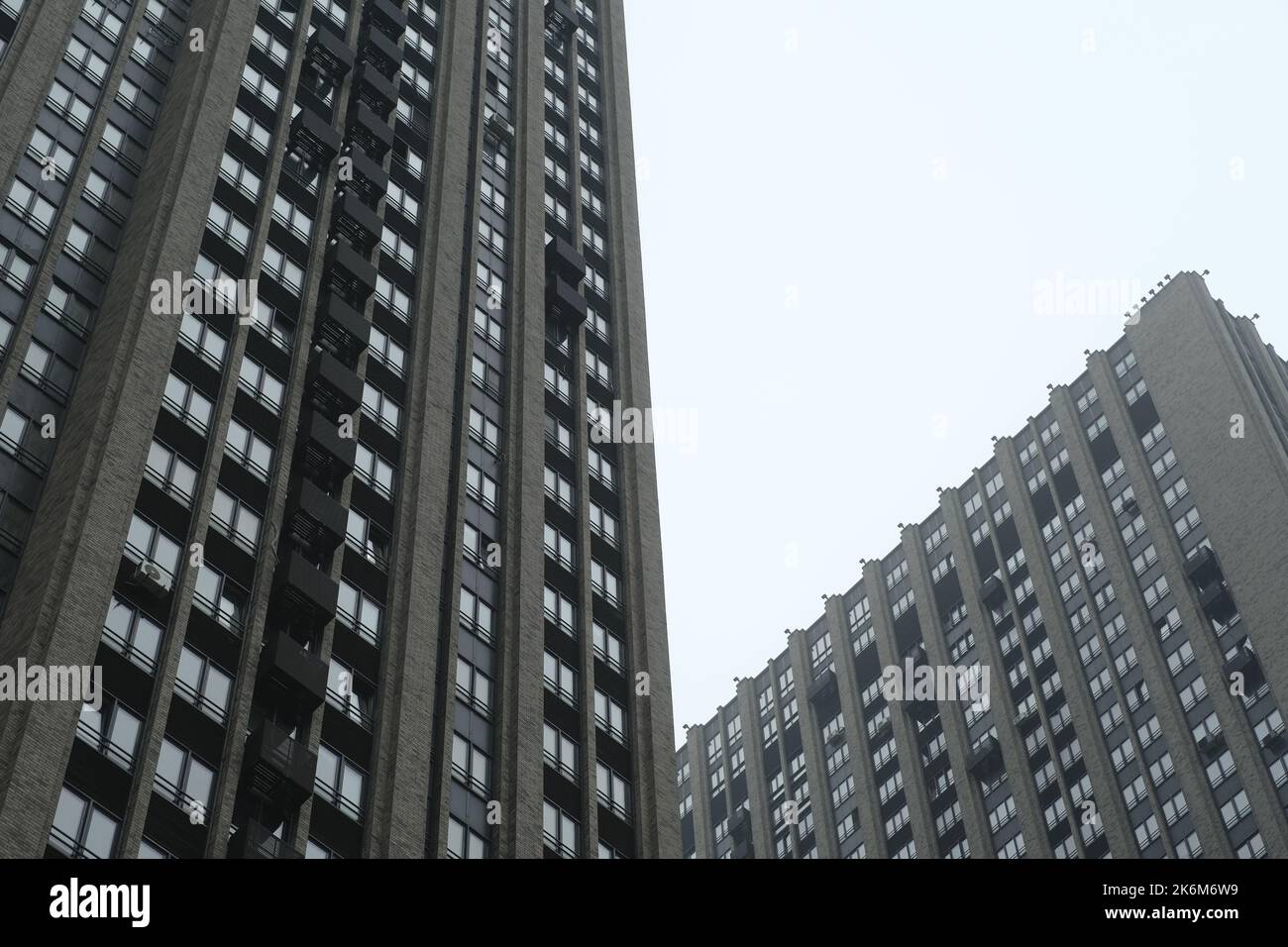 Photo inspiration: High Rise Modern Building Exterior Architectural Features Reference: Facade Of Modern Architecture Residential Building In Cloudy Weather