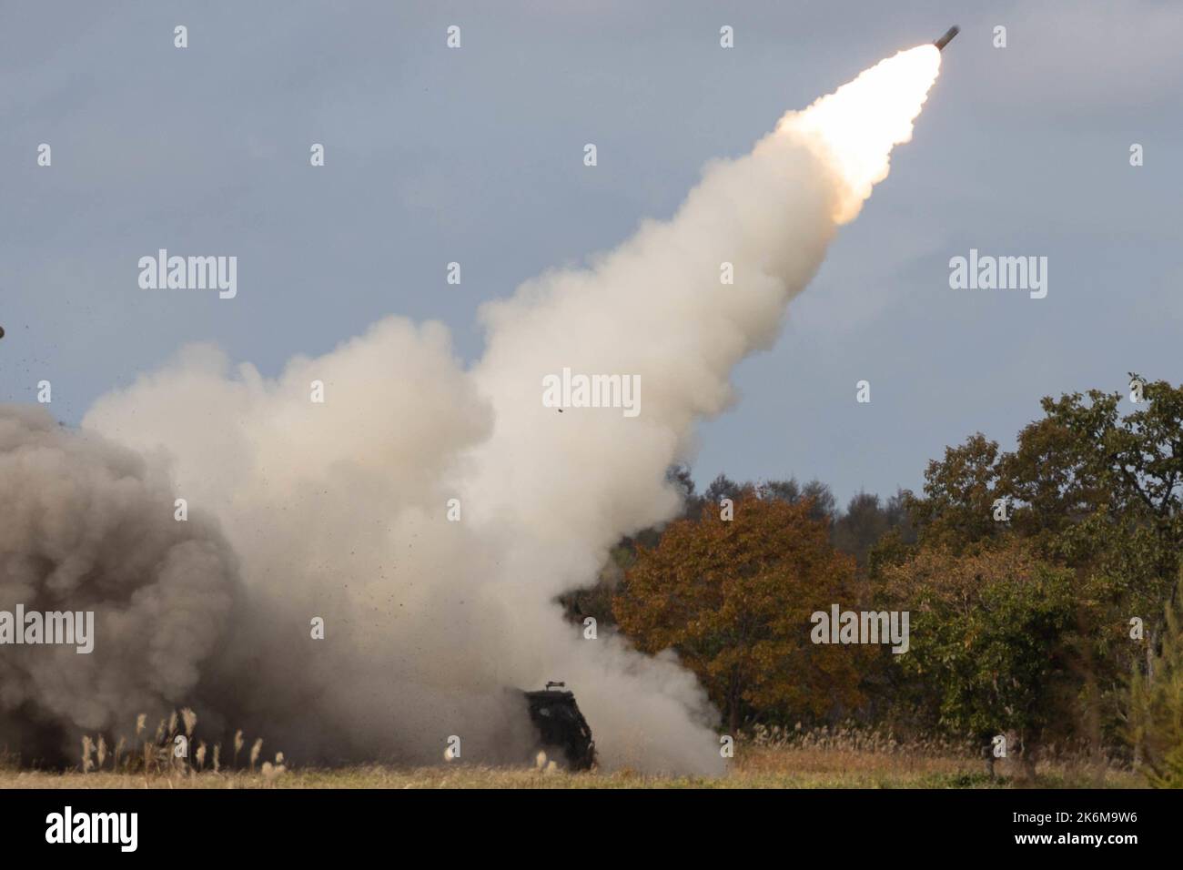 U.S. Marines with 3d Battalion, 12th Marines, 3d Marine Division, fire rockets from an M142 High Mobility Artillery Rocket System during exercise Resolute Dragon 22 at Yausubetsu Maneuver Area, Hokkaido, Japan, Oct. 14, 2022. Resolute Dragon 22 is an annual bilateral exercise designed to strengthen the defensive capabilities of the U.S.-Japan Alliance by exercising integrated command and control, targeting, combined arms, and maneuver across multiple domains. (U.S. Marine Corps photo by Cpl. Lorenzo Ducato) Stock Photo