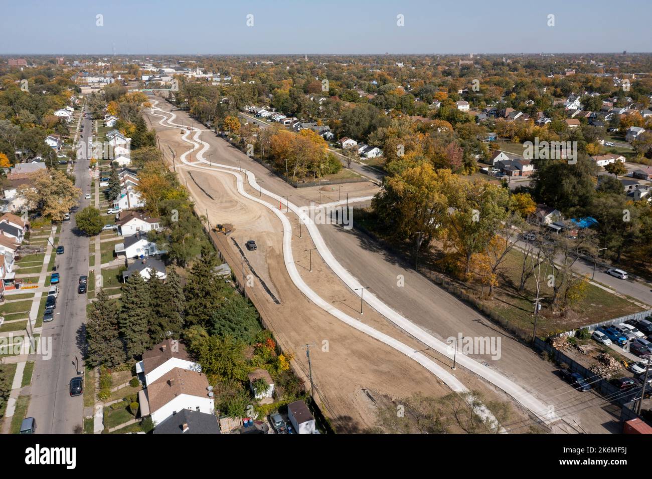 Detroit, Michigan, USA. 14th Oct, 2022. Work continues on the Joe Louis Greenway, a 27.5-mile bicycle/walking trail that will circle much of the city and parts of Highland Park, Hamtramck, and Dearborn. This first section, formerly a Conrail rail line, will be opened at the end of October. The entire project is expected to take 5 - 10 years. Credit: Jim West/Alamy Live News Stock Photo