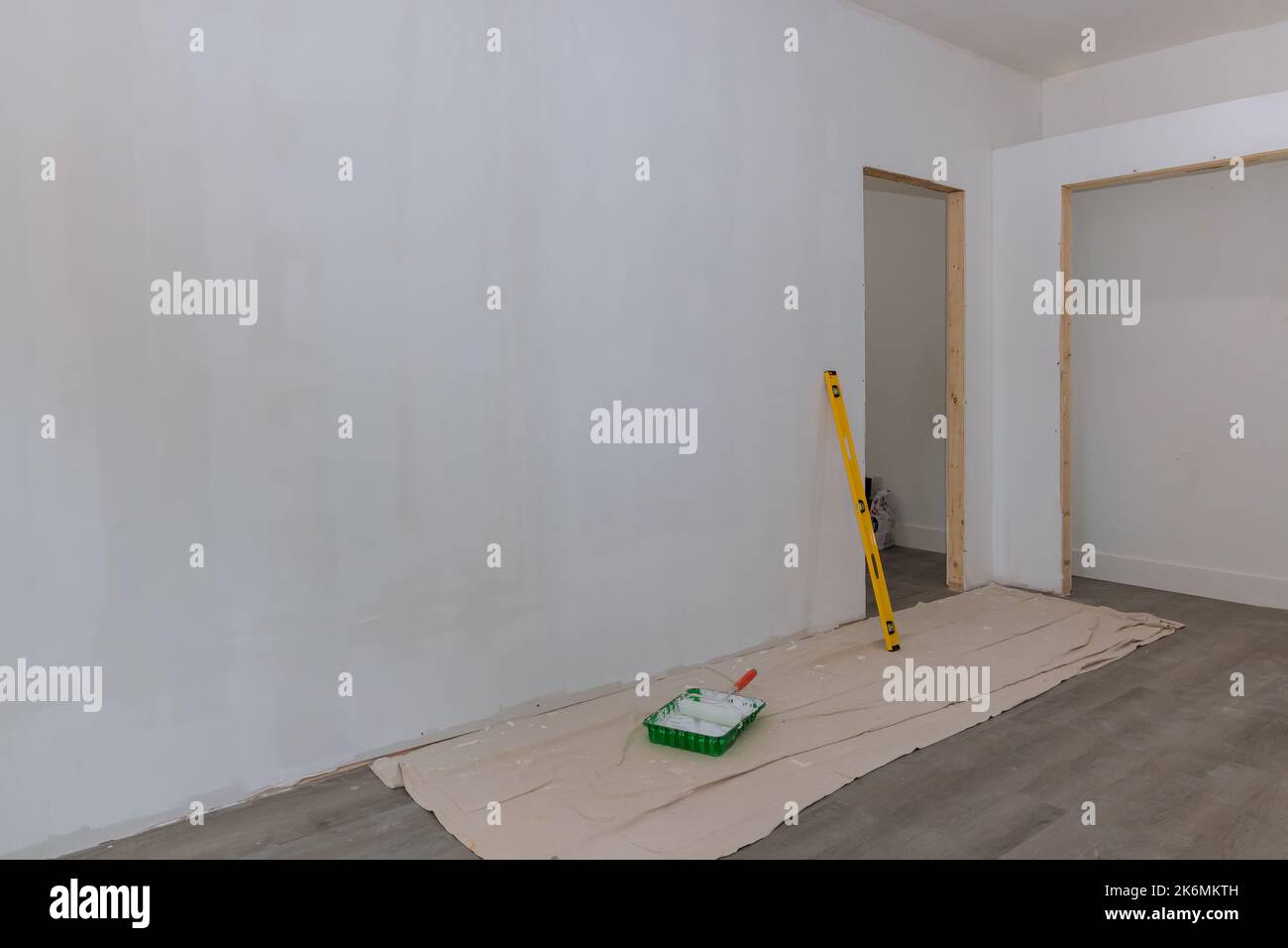 After primer has been applied to newly constructed homes walls, the