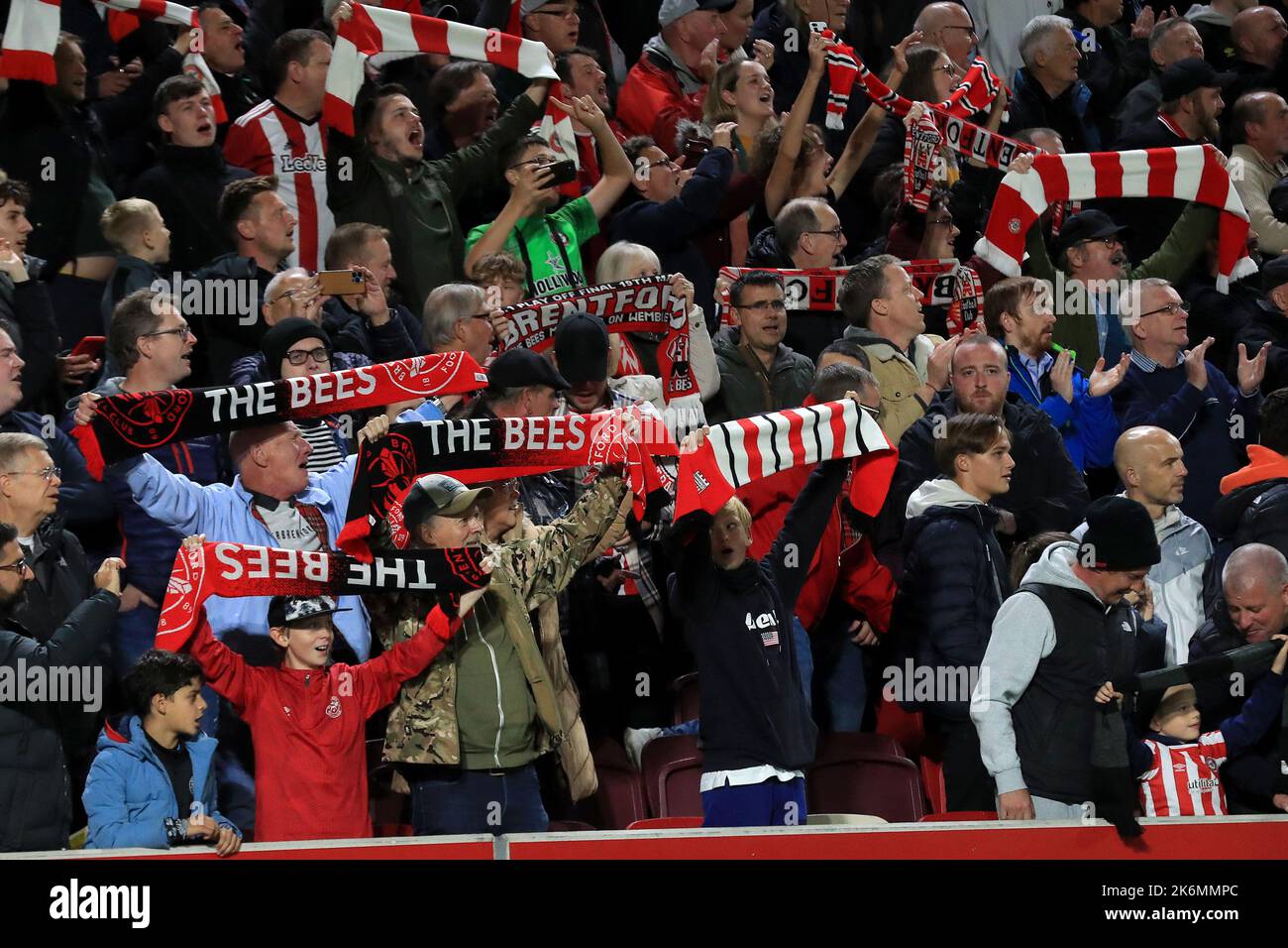 Brentford fans sing ÒHey JudeÓ prior to kick off during the Premier League match Brentford vs Brighton and Hove Albion at Brentford Community Stadium, London, United Kingdom, 14th October 2022  (Photo by Carlton Myrie/News Images) Stock Photo